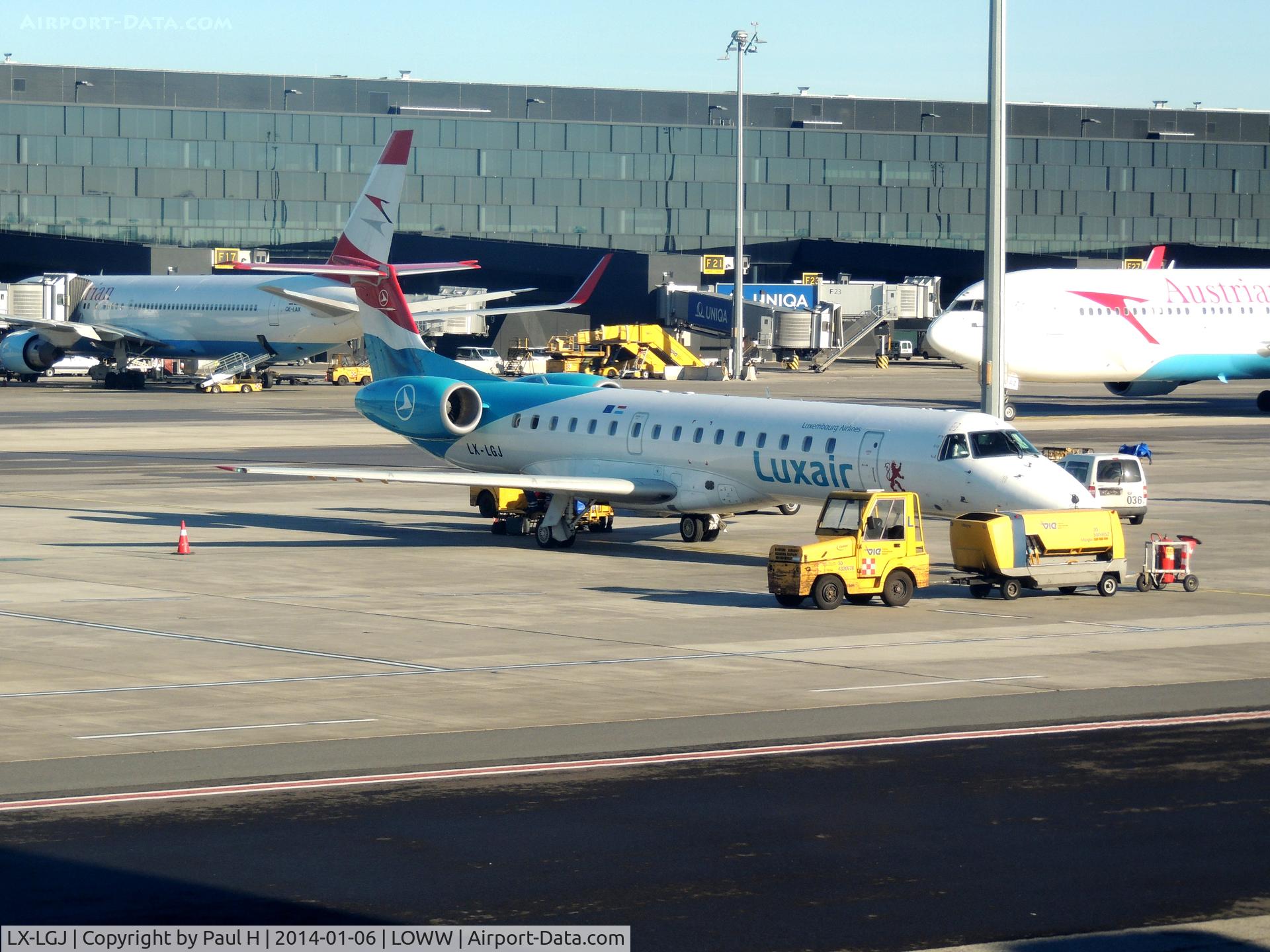 LX-LGJ, 2001 Embraer EMB-145LU (ERJ-145LU) C/N 145395, At VIE with two Austrian Airlines B767