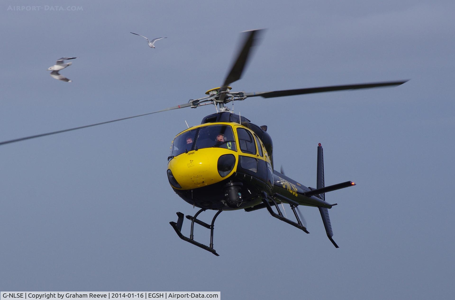 G-NLSE, 1987 Aerospatiale AS-355F-2 Ecureuil 2 C/N 5364, About to land.
