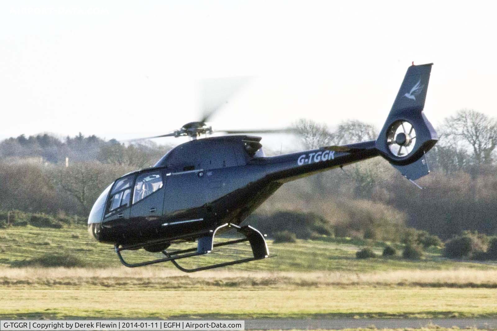 G-TGGR, 2001 Eurocopter EC-120B Colibri C/N 1224, Visiting EC-120B Colibri departing to the South.