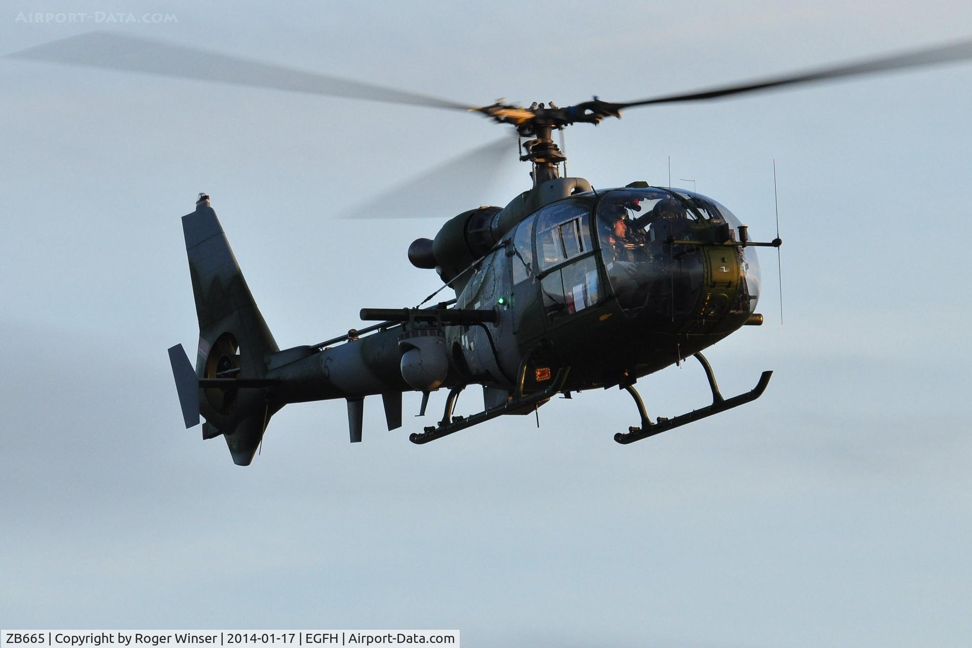 ZB665, 1983 Westland SA-341B Gazelle AH1 C/N 1932, Army Air Corps helicopter droping in for fuel.