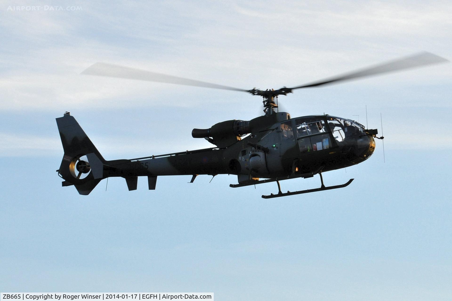 ZB665, 1983 Westland SA-341B Gazelle AH1 C/N 1932, Army Air Corps helicopter droping in for fuel.