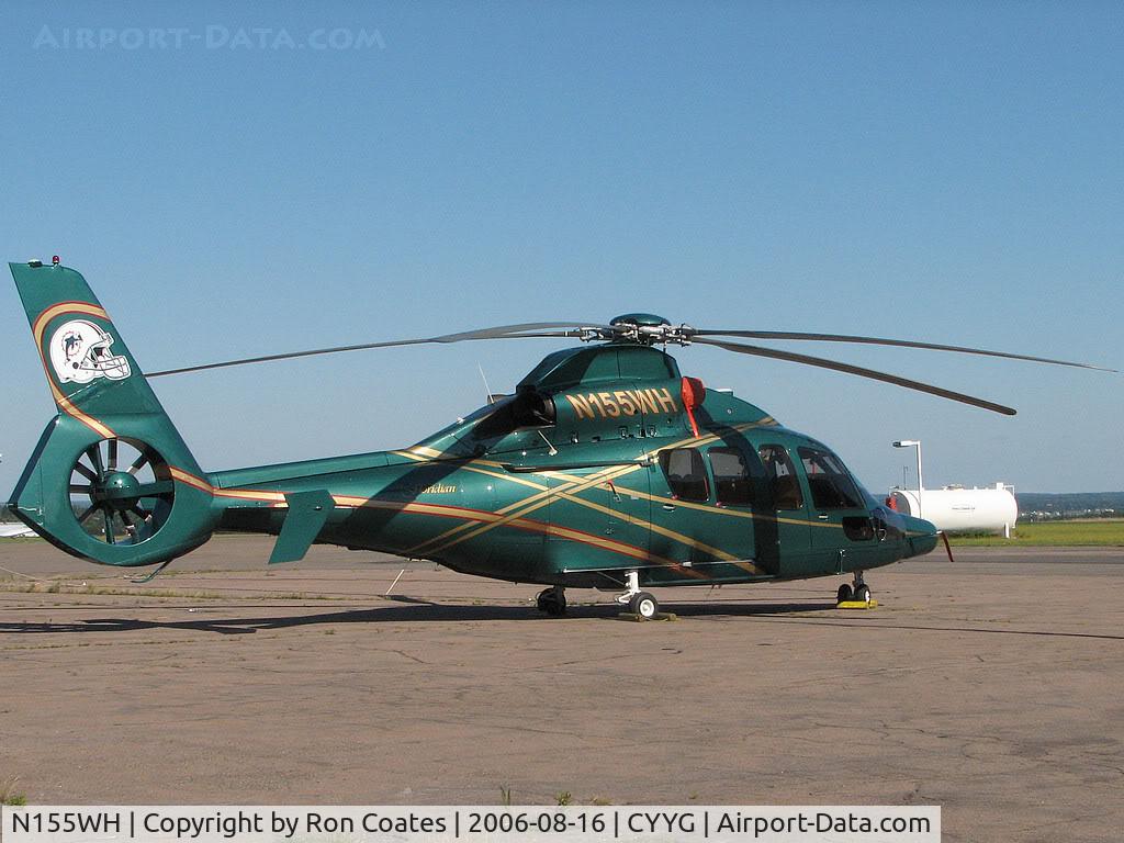 N155WH, 2000 Eurocopter EC-155B C/N 6563, This 2000 Eurocopter showing the Miami Dolphins insignia, sits at the Charlottetwn PEI Airport. It had just flown in from Wayne Huizenga's (Former Dolphins Owner) Yacht, anchored in the harbor.