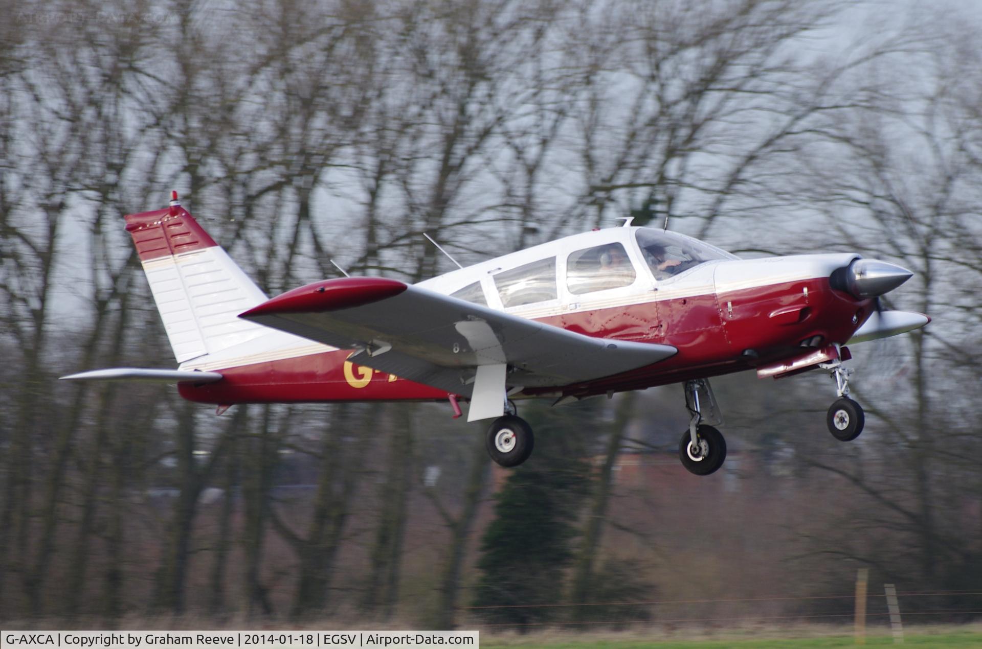 G-AXCA, 1969 Piper PA-28R-200 Cherokee Arrow C/N 28R-35053, Just taken off.