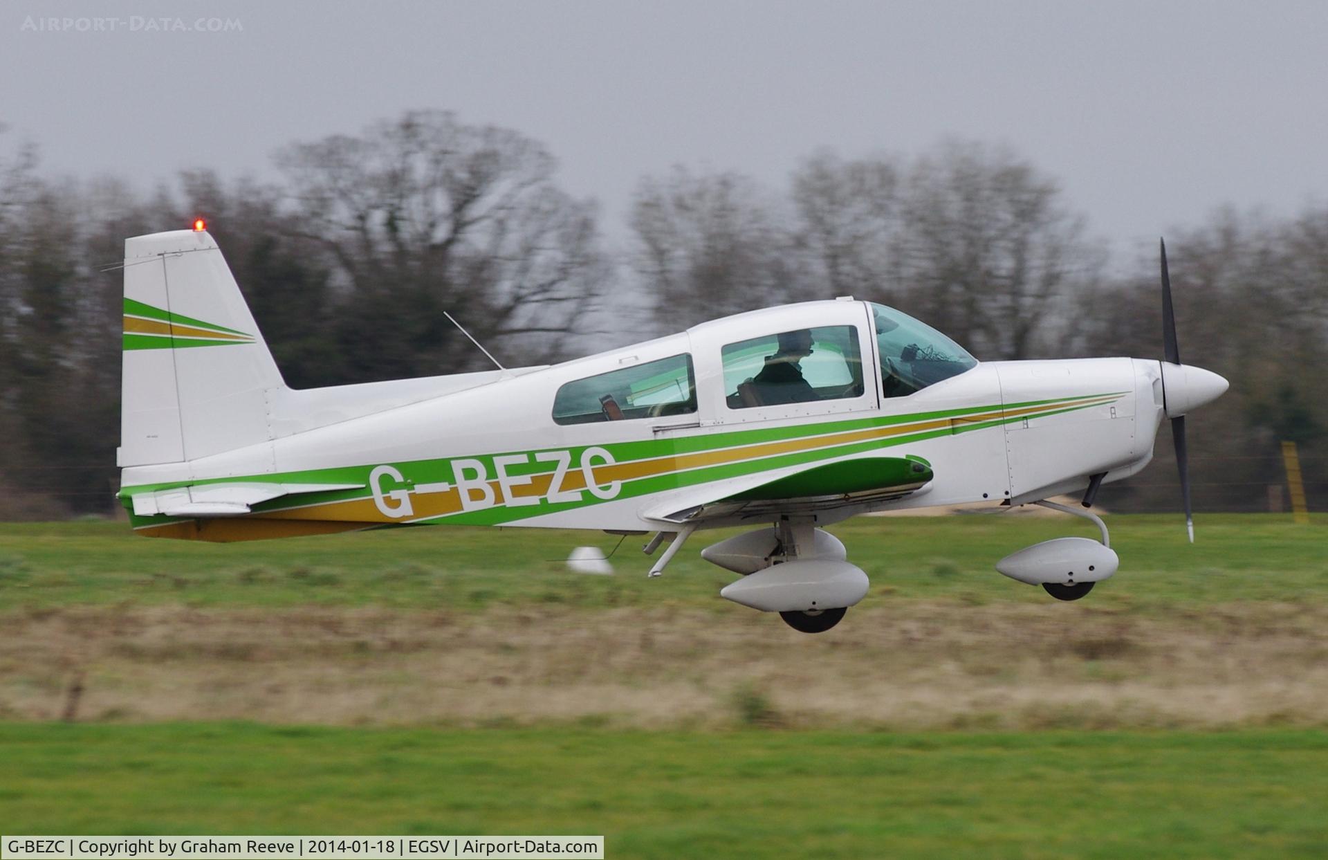 G-BEZC, 1974 Grumman American AA-5 Traveler C/N AA5-0493, Just taken off.
