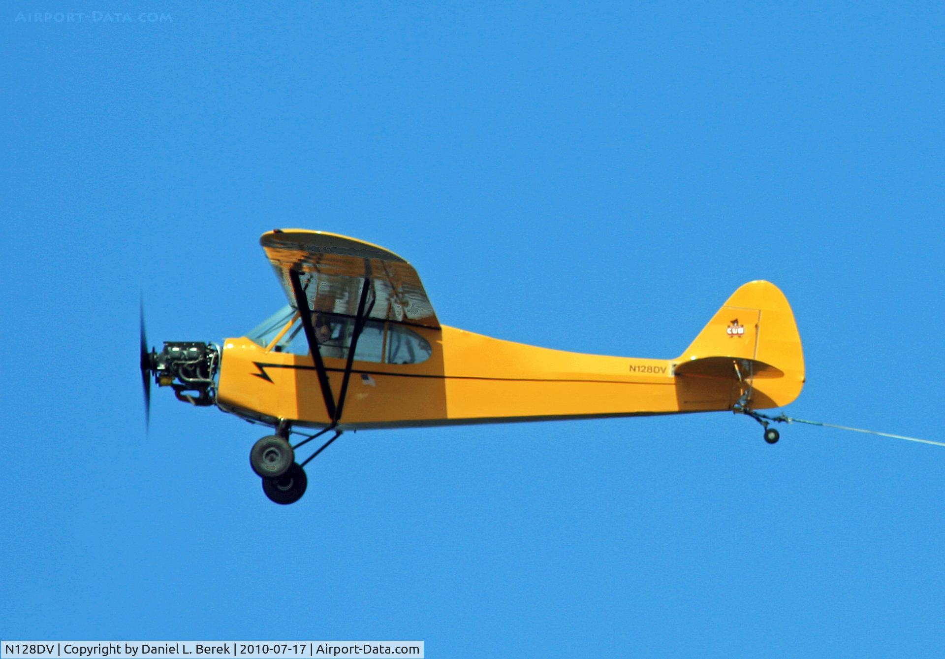 N128DV, 1955 Piper PA-18A-150 Super Cub C/N 18-4366, A vintage Super Cub hard at work towing and advertising banner off the Jersey Short.