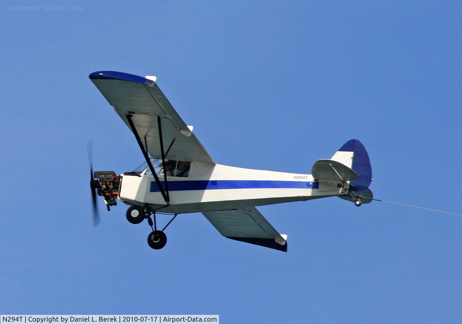 N294T, Piper PA-18-105 Special C/N 18-2408, A vintage Super Cub earns a day's living by towing an advertising banner off the Jersey Shore.