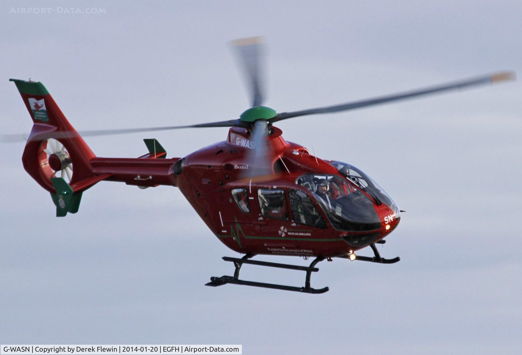 G-WASN, 2008 Eurocopter EC-135T-2+ C/N 0746, EGFH based Welsh Air ambulance Helimed 57 over the pan responding to a 