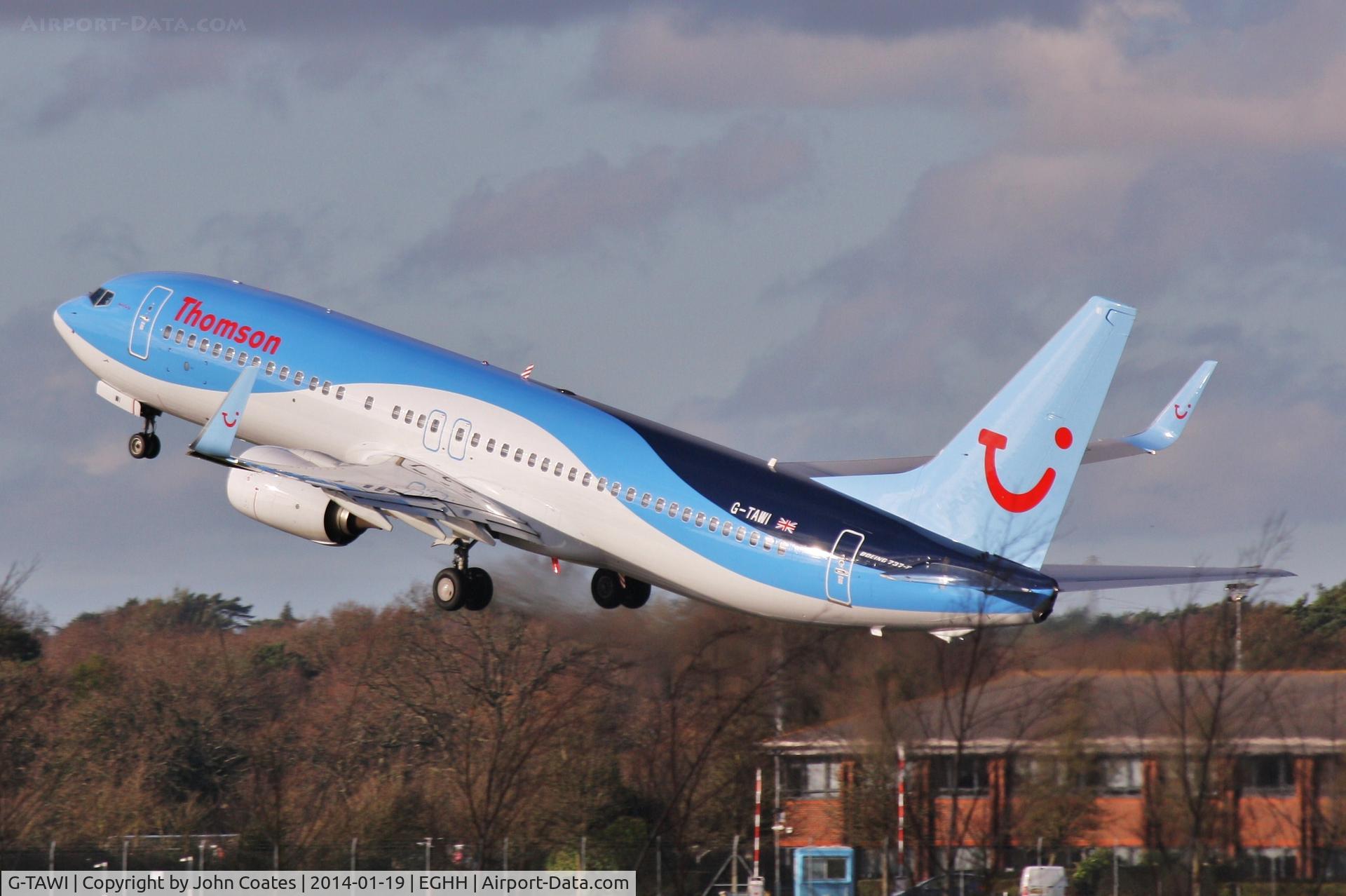 G-TAWI, 2012 Boeing 737-8K5 C/N 37267, Climbing out through the trees in its new livery