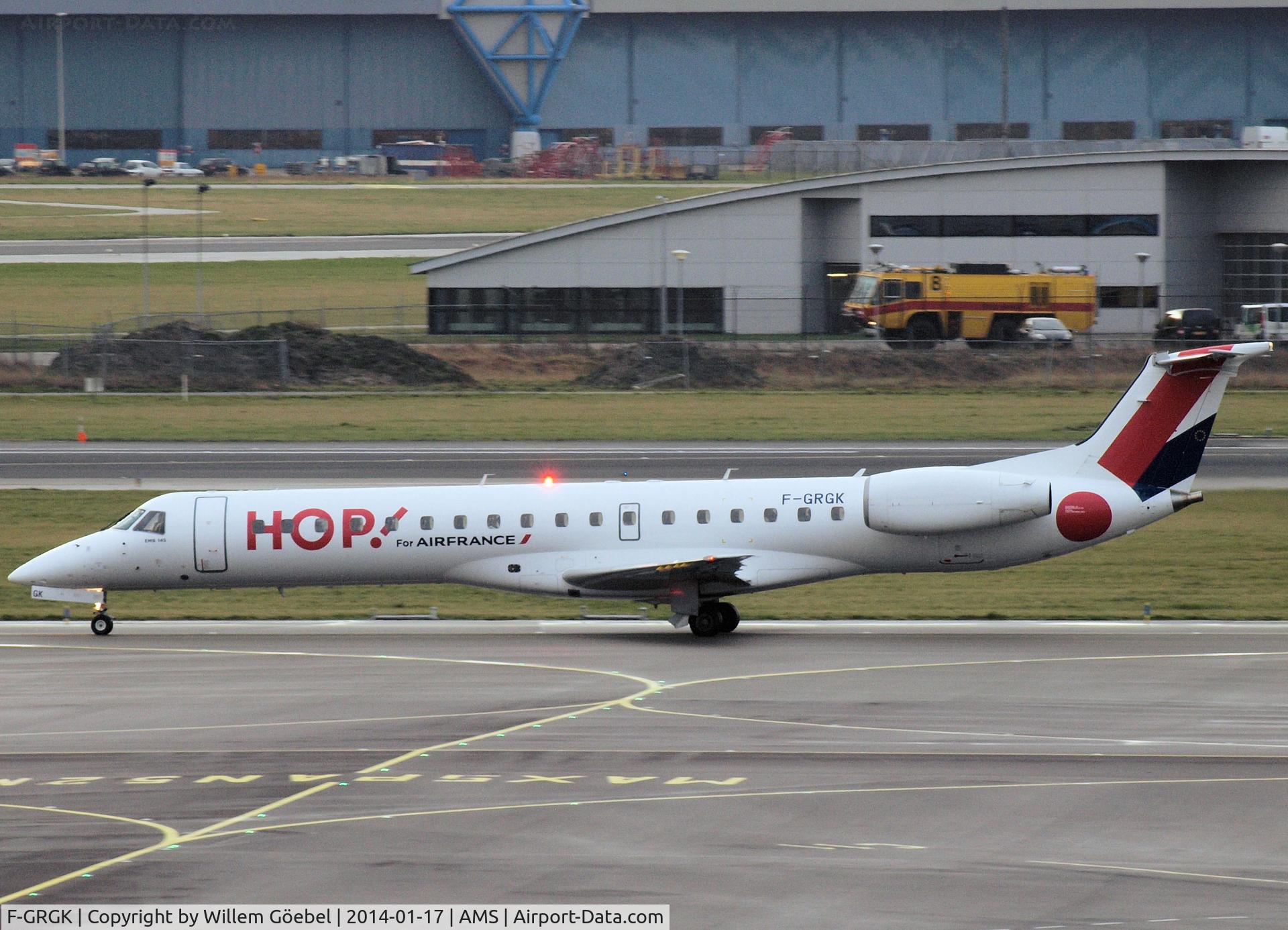 F-GRGK, 2000 Embraer EMB-145EU (ERJ-145EU) C/N 145324, Taxi to runway L18 of Schiphol Airport (HOP Colours)
