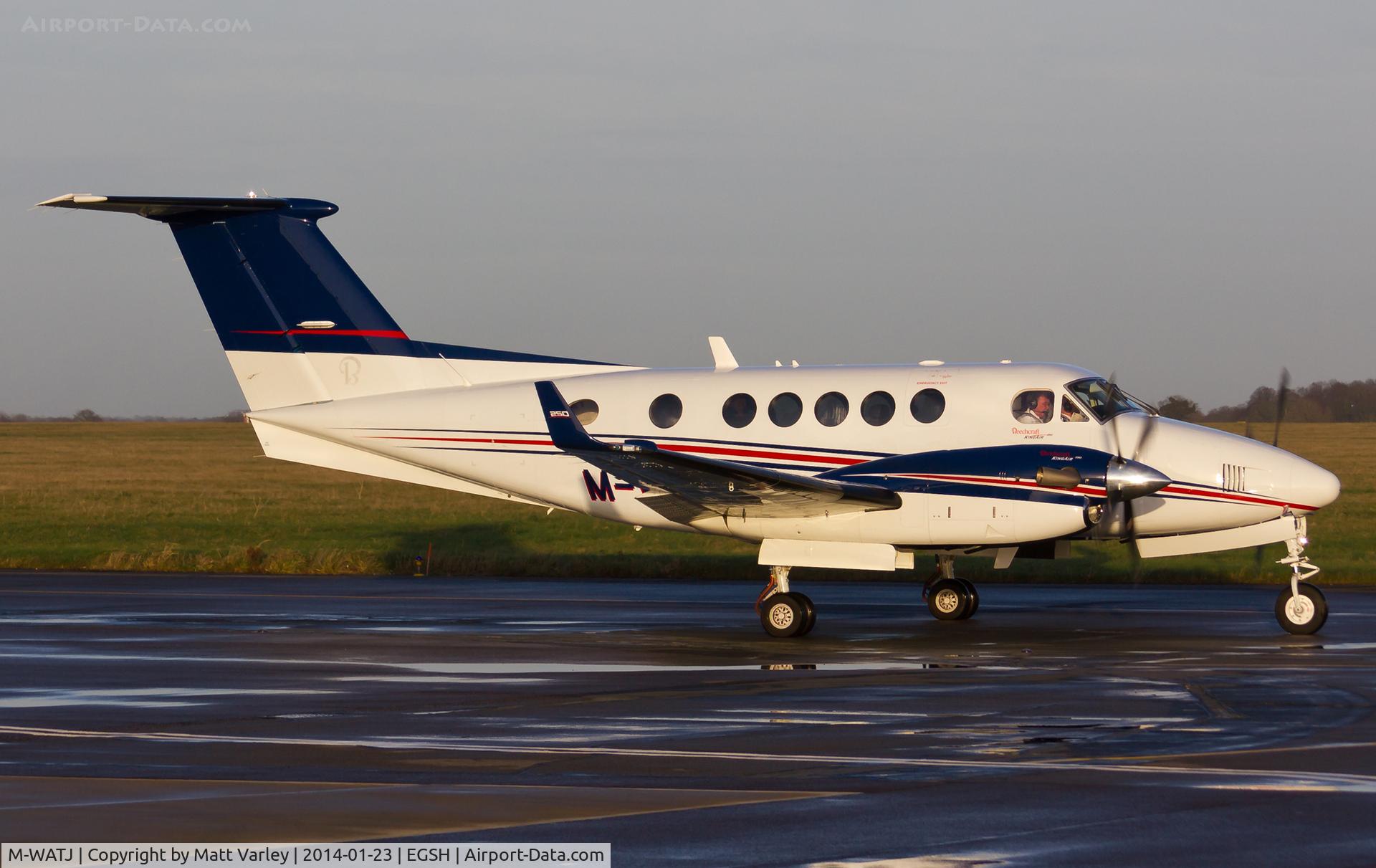 M-WATJ, 2012 Hawker Beechcraft B200GT King Air C/N BY-139, Taxiing for departure in the low afternoon sun....