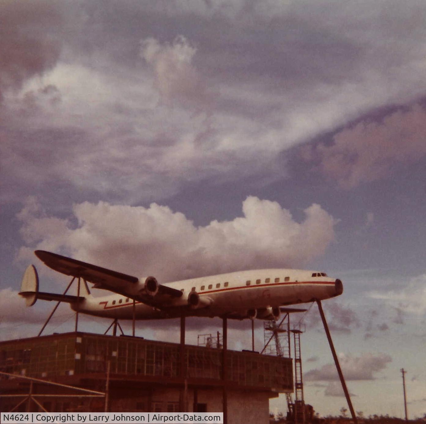 N4624, Lockheed L-1049G Super Constellation C/N 4617, Mounted on top of a gas station on Tamiami Trail by the 40 mile bend in the Everglades in FL in the 1970's.