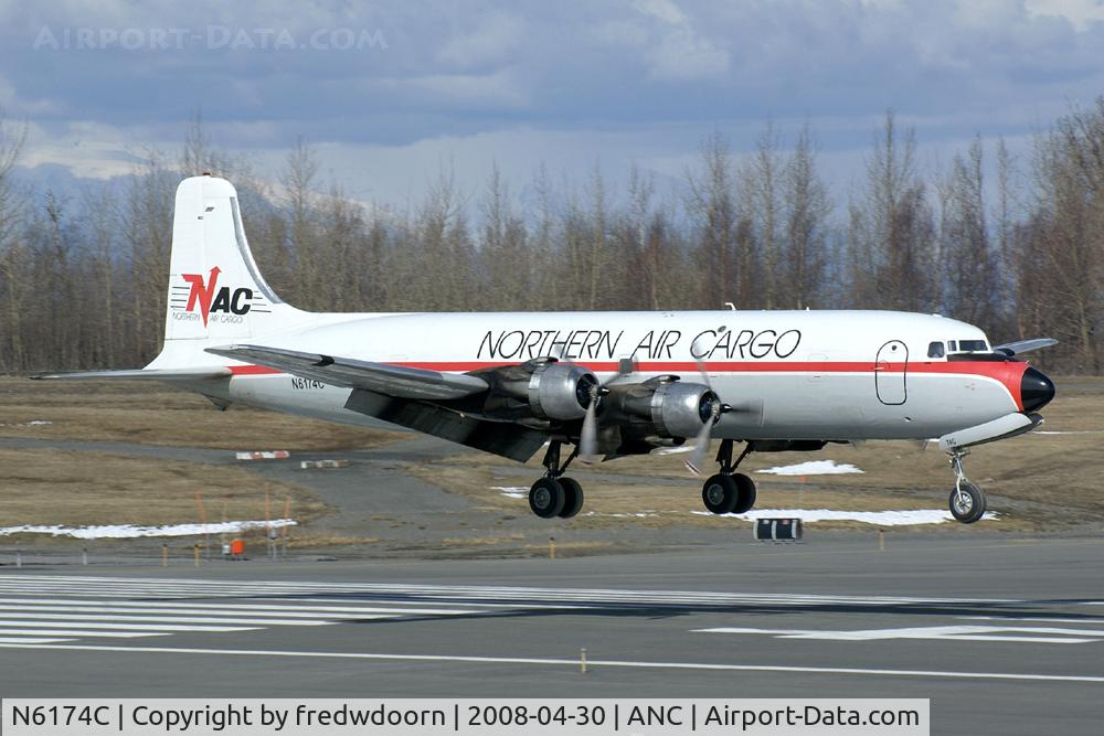 N6174C, 1954 Douglas DC-6A C/N 44075, About to touch down