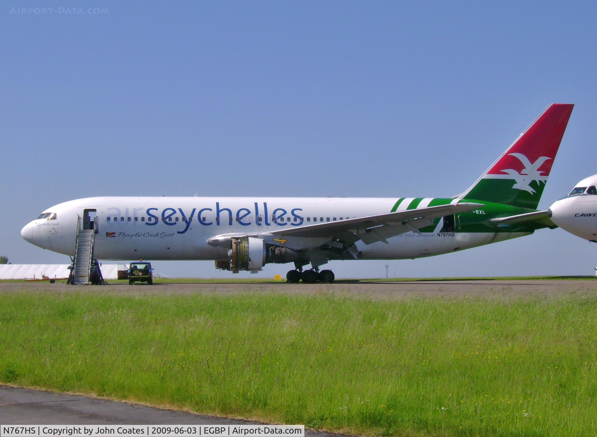 N767HS, 1988 Boeing 767-204 C/N 24013, Still showing old reg S7-EXL