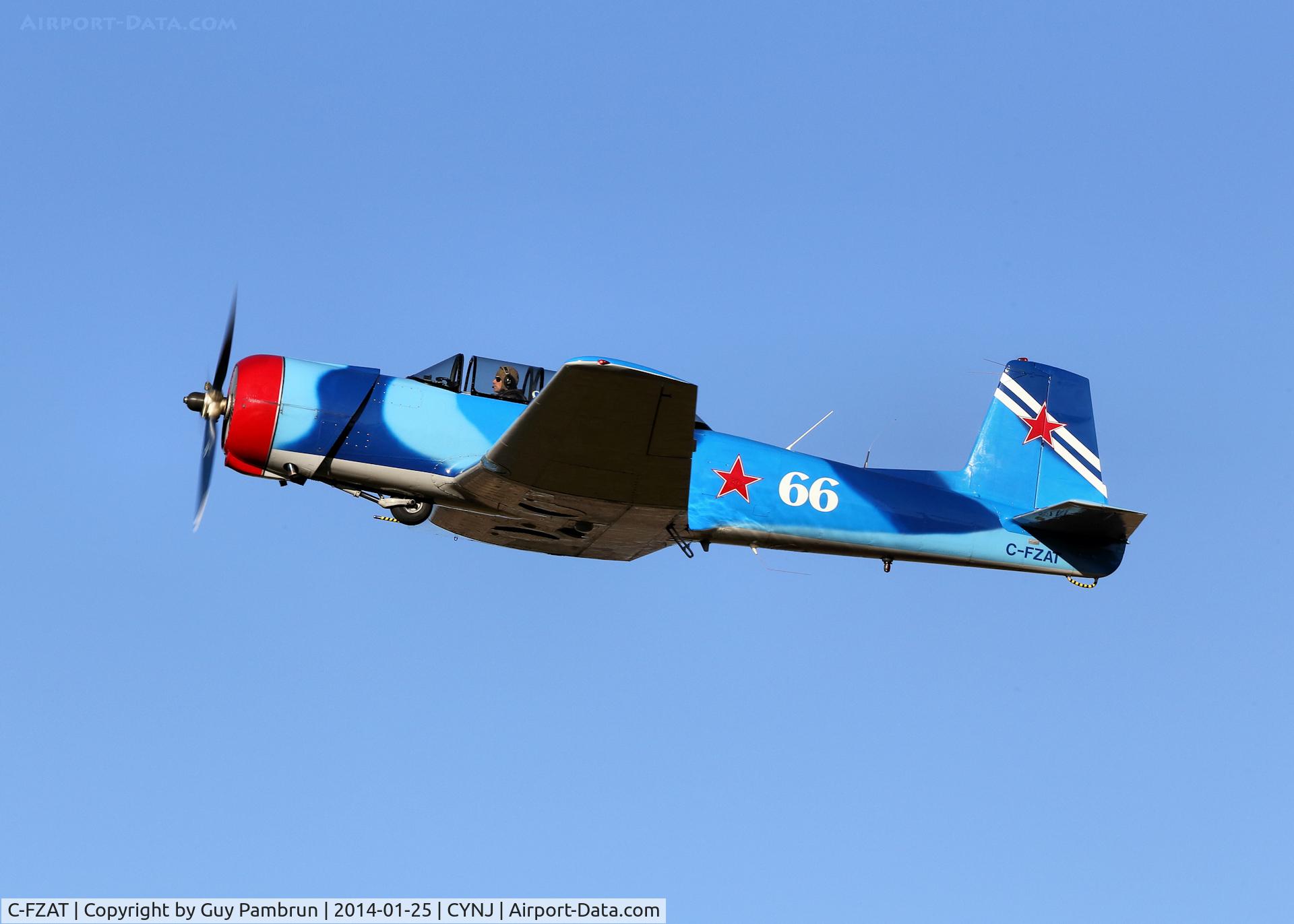 C-FZAT, 1985 Nanchang CJ-6A C/N 4132018, Gear up after takeoff