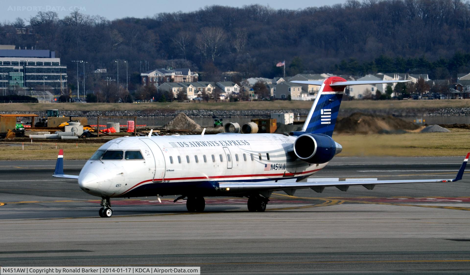 N451AW, 2003 Bombardier CRJ-200LR (CL-600-2B19) C/N 7832, Taxi off runway National
