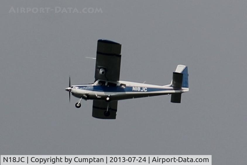 N18JC, 1974 Helio HT-295 Super Courier C/N 1719, Flying over Eldora Speedway in Rossburg, Ohio for the 1st NASCAR Truck Race. This plane was used to televise the race live on SPEED Channel.