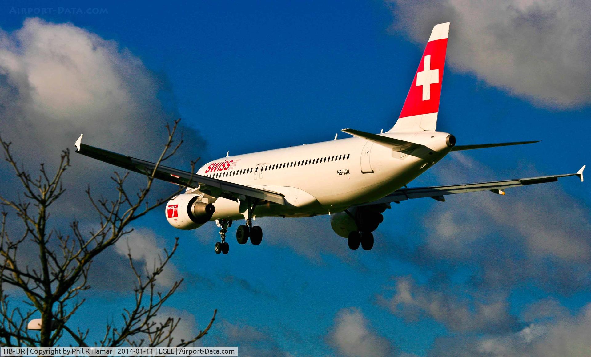 HB-IJR, 1997 Airbus A320-214 C/N 0703, SWISS Air, (HB-IJR) 1997 Airbus A320-214, c/n 0703, on approach to land on 27L Heathrow. © PhilRHamar