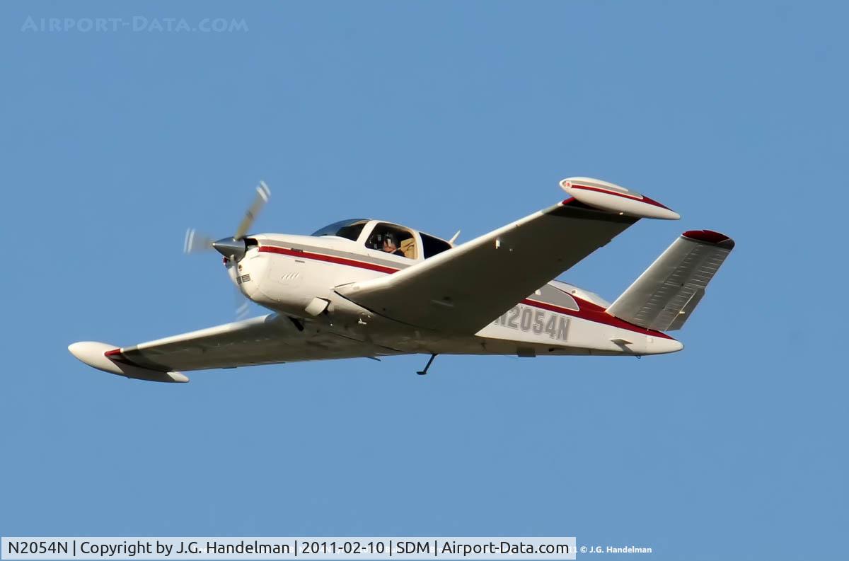 N2054N, 1978 Beech V35B Bonanza C/N D-10196, Climbing out.