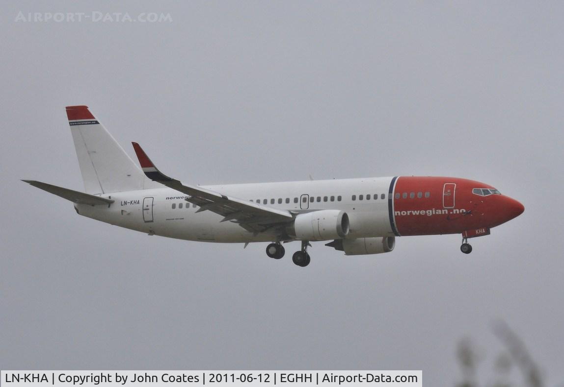 LN-KHA, 1998 Boeing 737-31S C/N 29100, Low approach on air test from Lasham in mist and drizzle in 