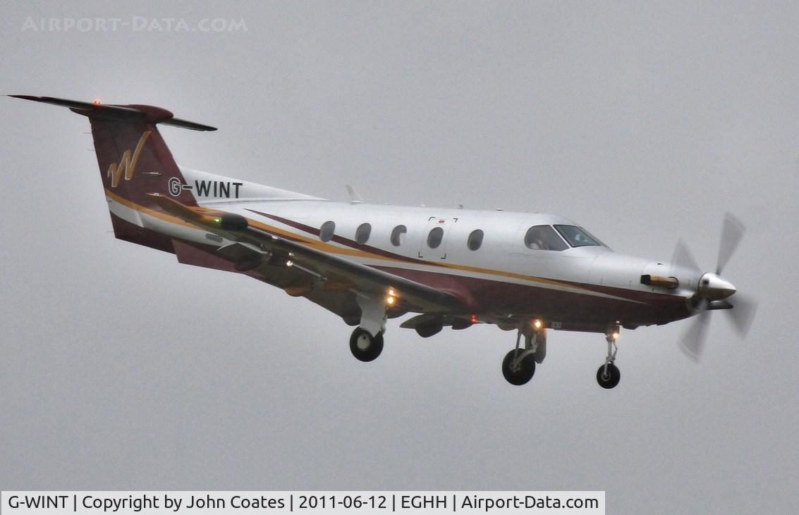G-WINT, 2007 Pilatus PC-12/47 C/N 830, Finals to 08 in wet and windy weather