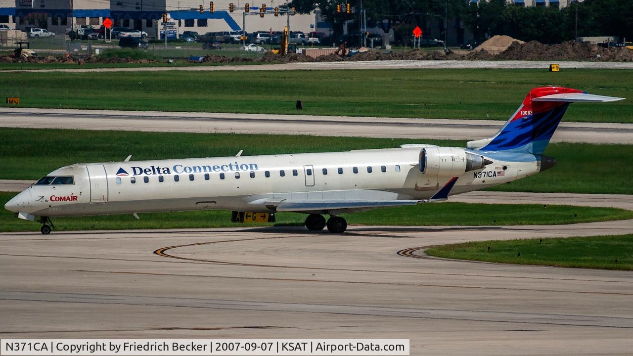 N371CA, 2003 Bombardier CRJ-701ER (CL-600-2C10) Regional Jet C/N 10082, taxying to the active