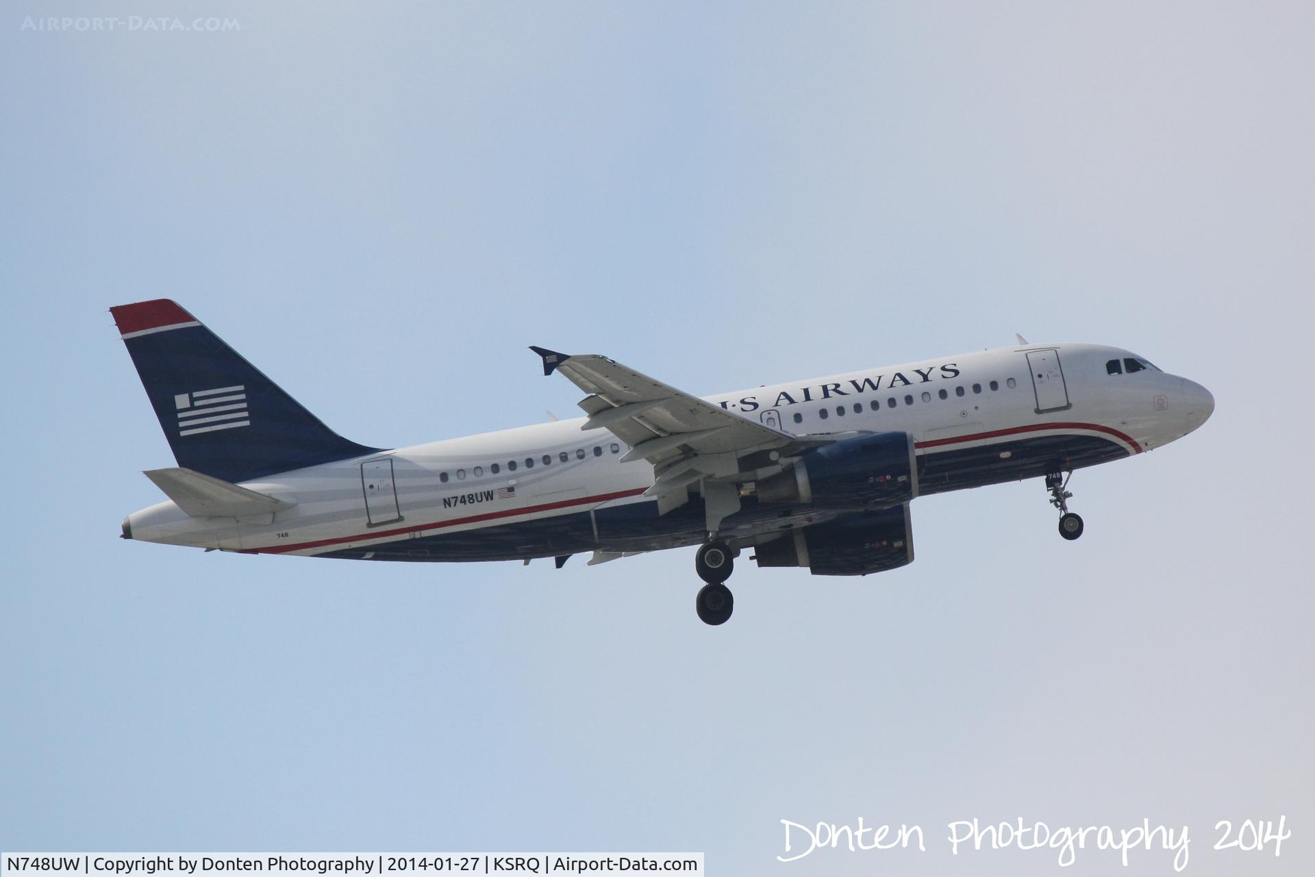 N748UW, 2000 Airbus A319-112 C/N 1311, US Air Flight 2015 (N748UW) arrives at Sarasota-Bradenton International Airport following a flight from Charlotte-Douglas International Airport
