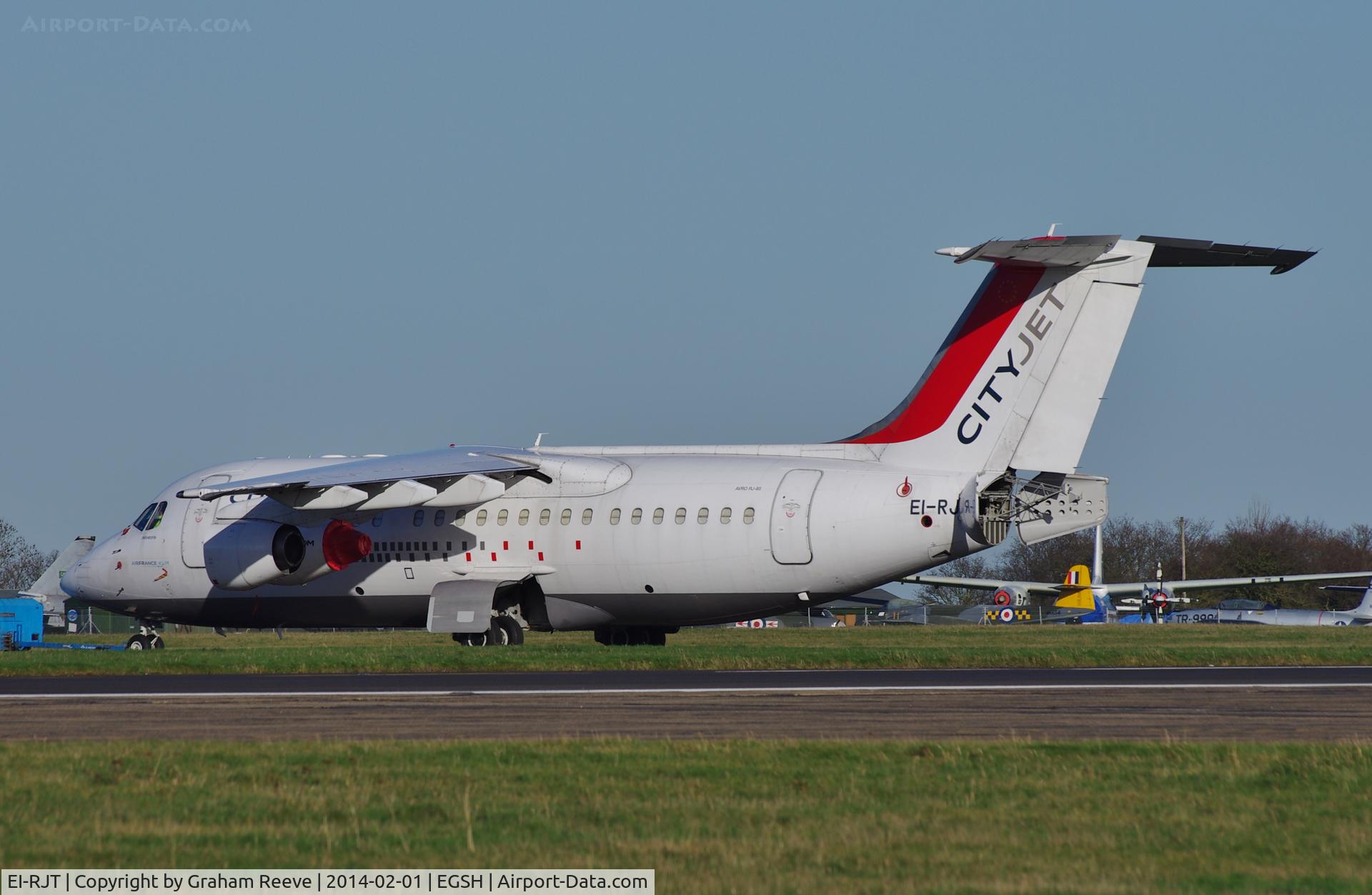 EI-RJT, 2000 British Aerospace Avro 146-RJ85A C/N E2366, Under tow at Norwich.