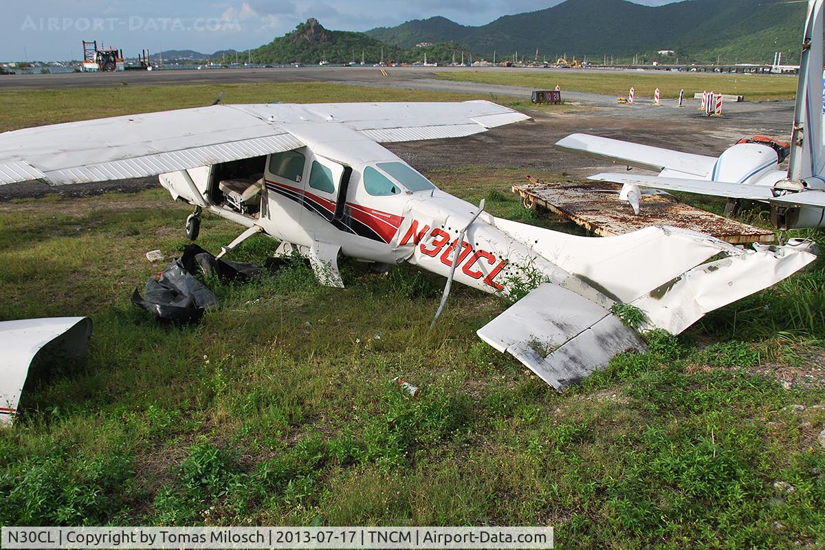 N30CL, 1965 Cessna 210E Centurion C/N 21058695, Stored in a remote corner of the airport.