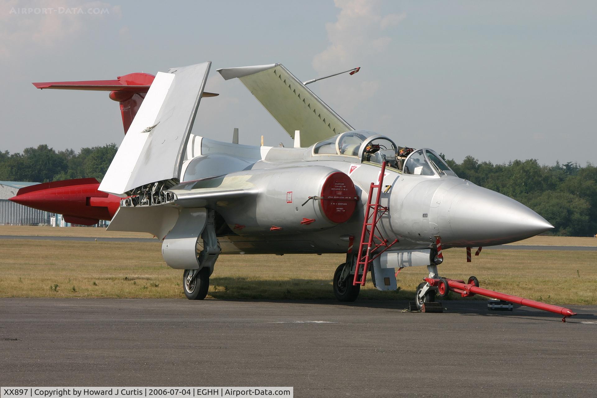 XX897, 1976 Hawker Siddeley Buccaneer S.2B C/N B3-02-75, Wings folded after a fast run down the runway. Alas this never did fly again and after years in external storage it departed to a new home in Ireland in August 2012.