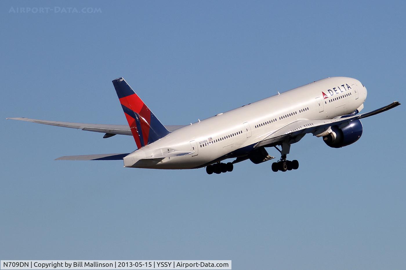 N709DN, 2010 Boeing 777-232/LR C/N 40559, AWAY FROM 34L