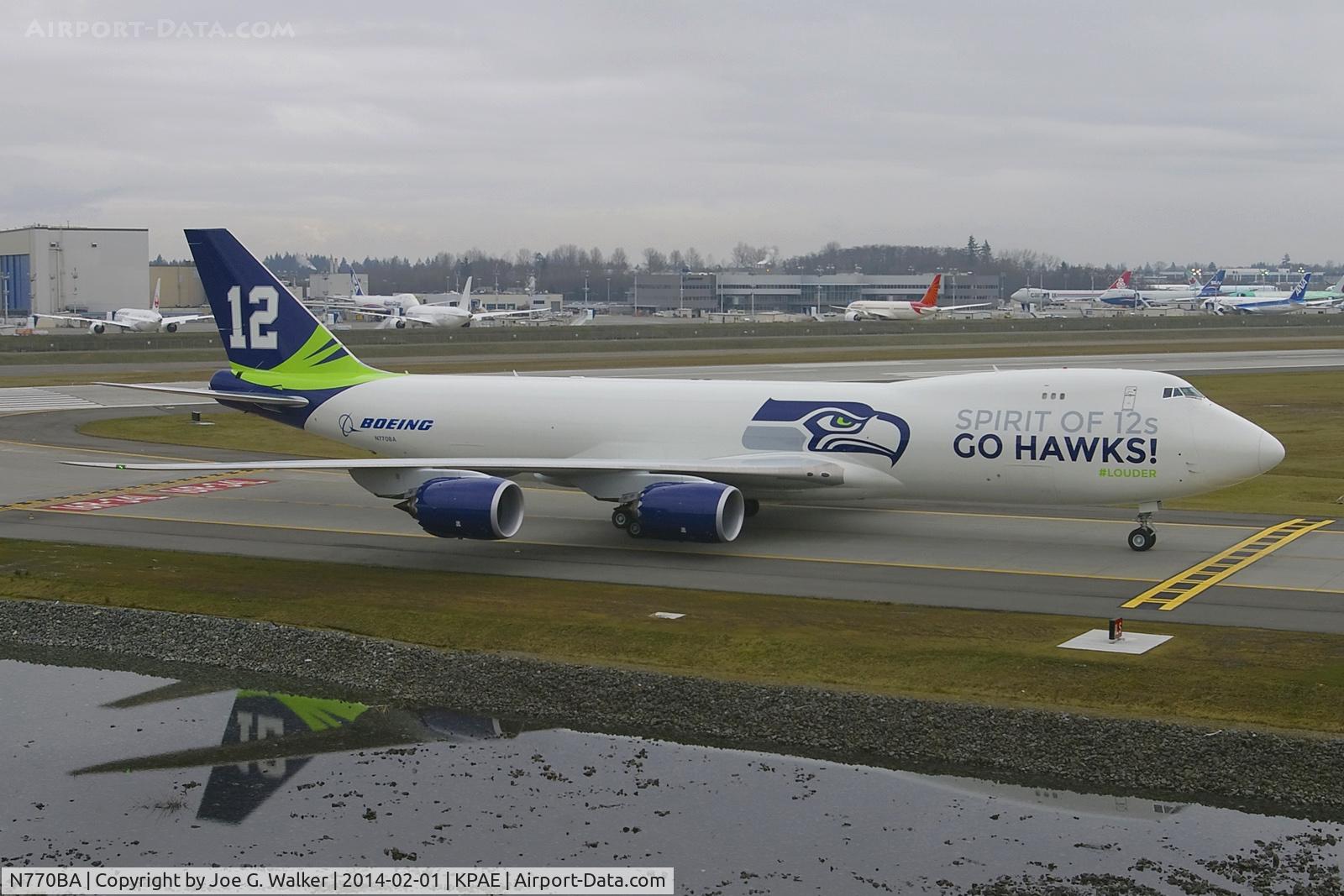 N770BA, 2011 Boeing 747-87UF C/N 37564, To celebrate the team sucess, this company owned 747-8F has been painted in the colors of the Seattle Seahawks.