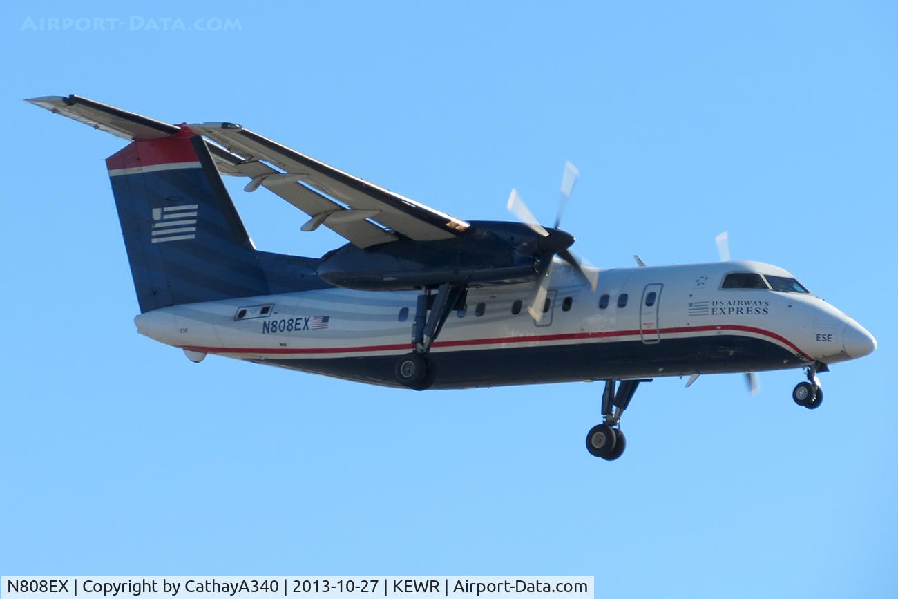N808EX, 1991 Boeing DHC-8-102 C/N 299, Landing on Runway 22L