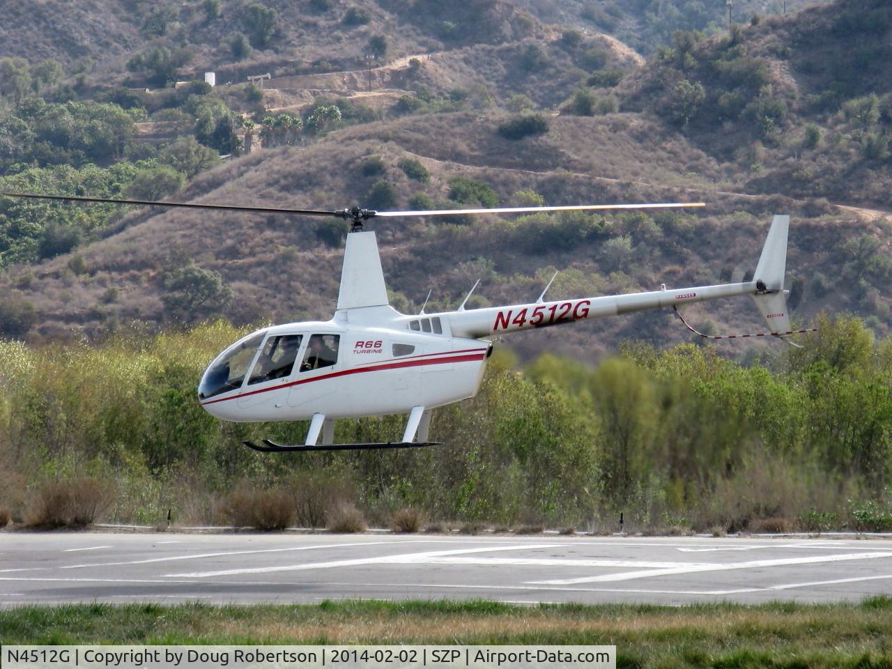 N4512G, Robinson R66 C/N 0003, 2010 Robinson R66, one Rolls Royce 250-C300/A1 Turboshaft derated to 270 shp for takeoff, 224 shp max continuous, third prototype, Experimental class R&D, hover turn after liftoff SZP helipad