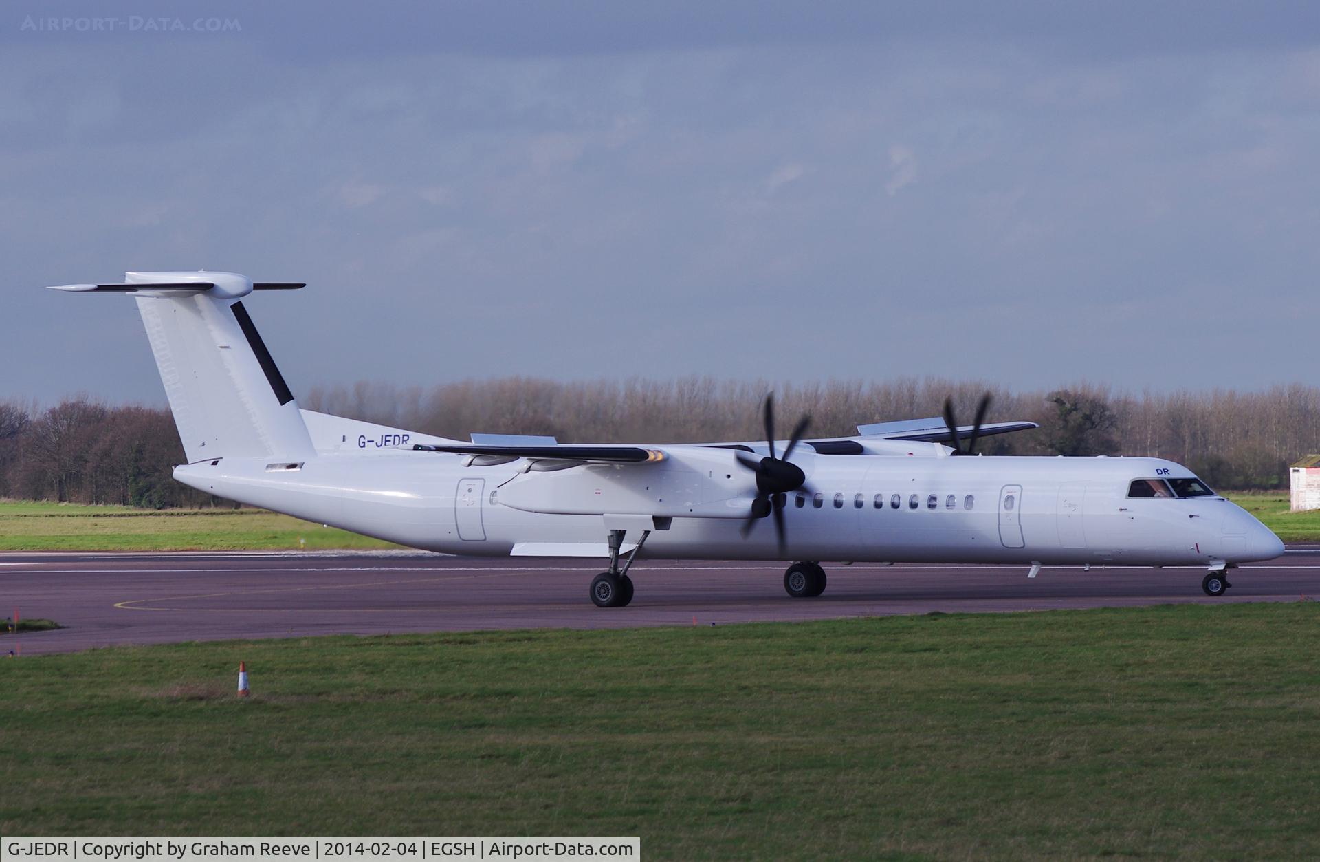 G-JEDR, 2003 De Havilland Canada DHC-8-402Q Dash 8 C/N 4087, About to depart having been resprayed.