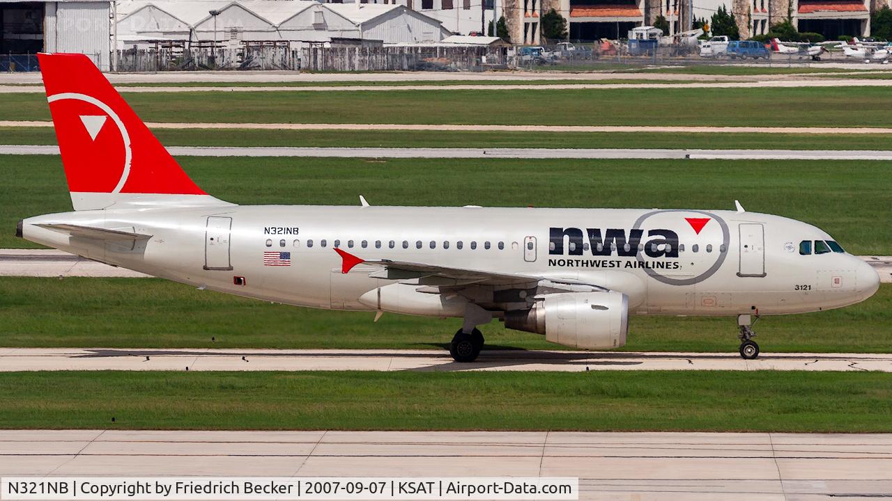 N321NB, 2001 Airbus A319-114 C/N 1414, taxying to the gate