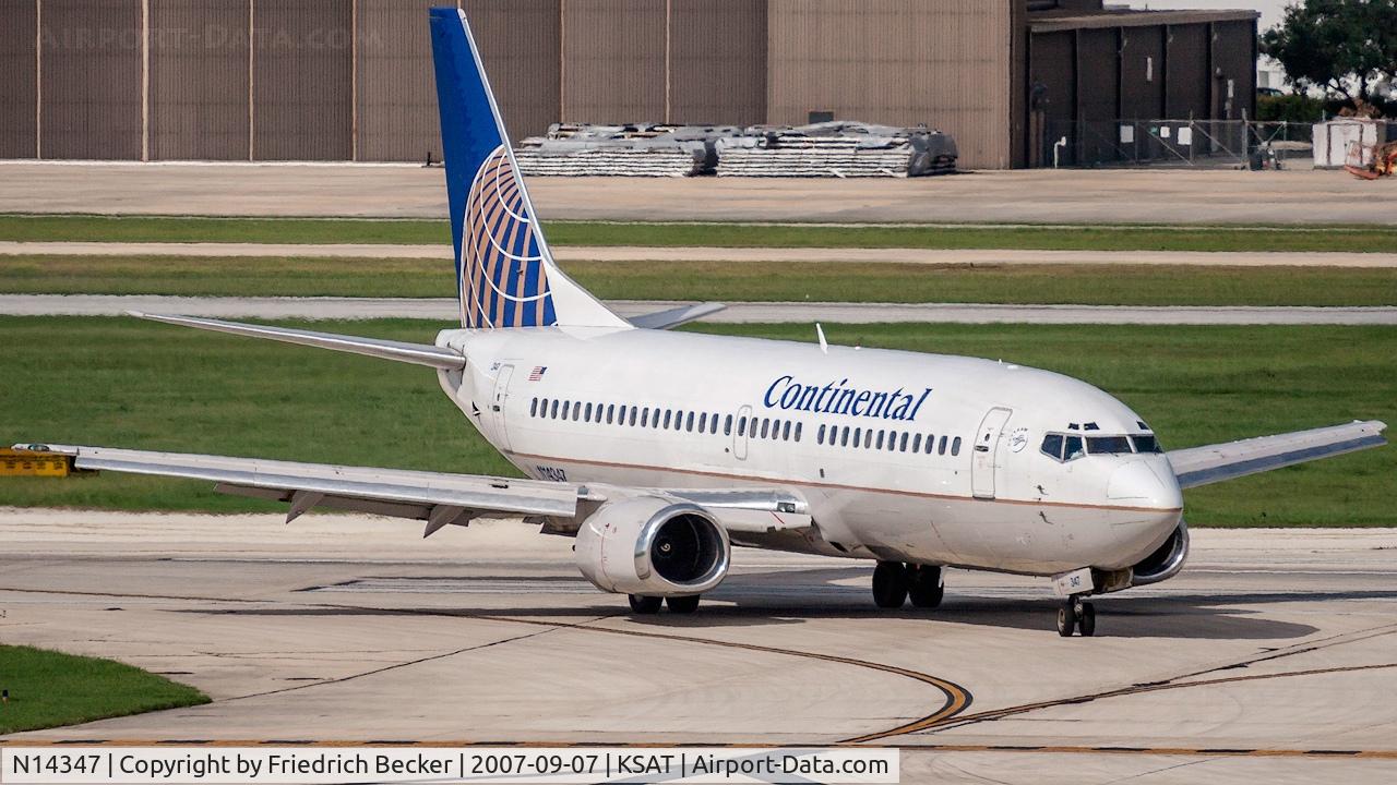 N14347, 1987 Boeing 737-3TO C/N 23585, taxying to the gate
