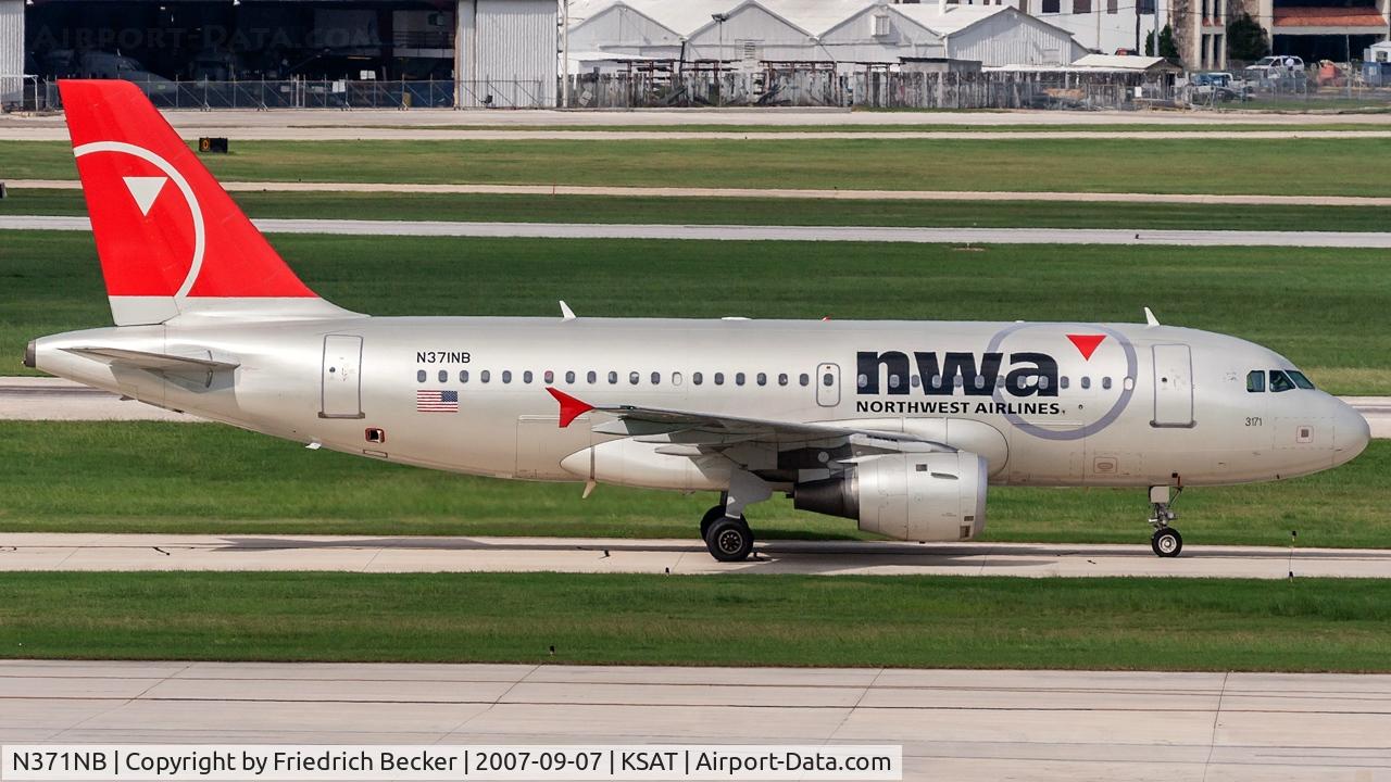 N371NB, 2003 Airbus A319-114 C/N 2095, taxying to the gate