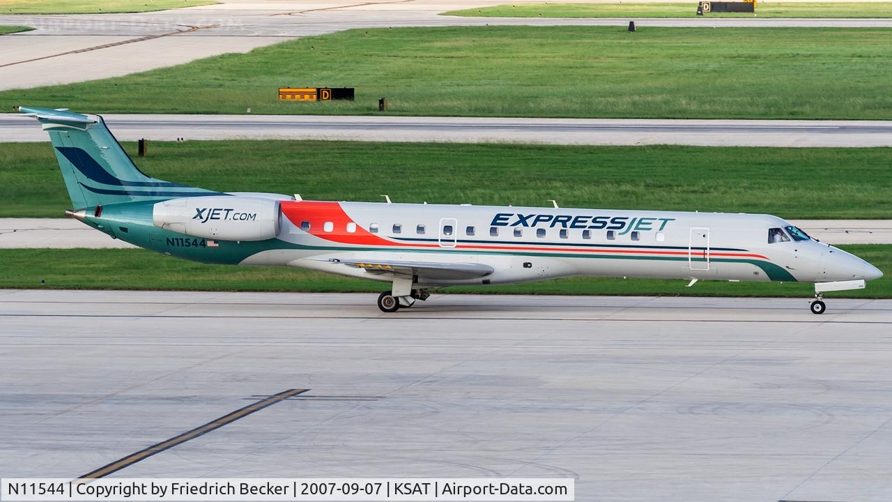 N11544, 2002 Embraer ERJ-145LR (EMB-145LR) C/N 145557, taxying to the gate