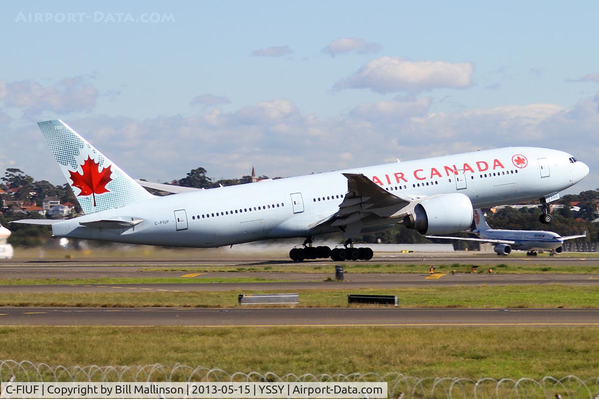 C-FIUF, 2007 Boeing 777-233/LR C/N 35243, away off 34L