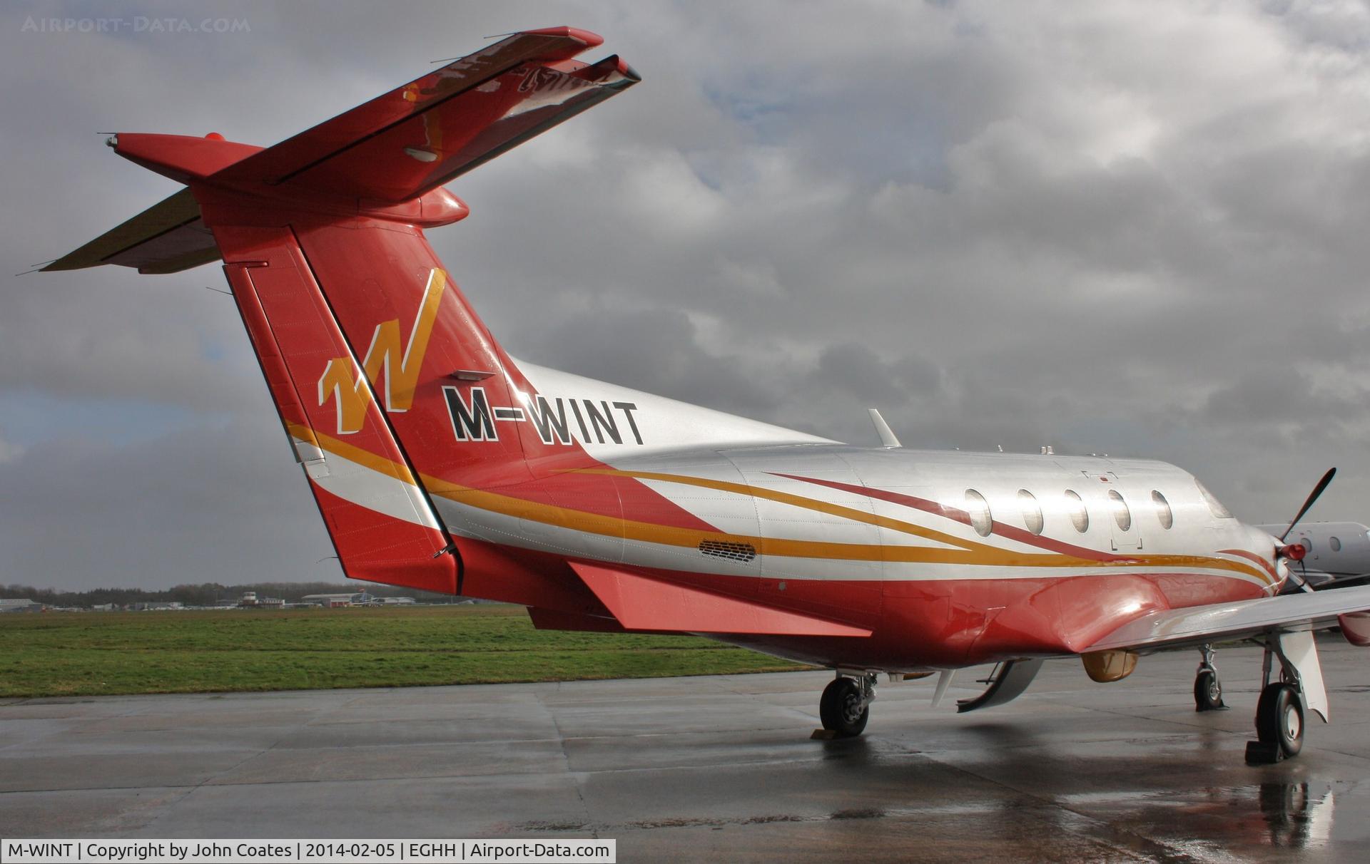 M-WINT, 2012 Pilatus PC-12/47E C/N 1346, Facing into the gale at Pilatus Centre