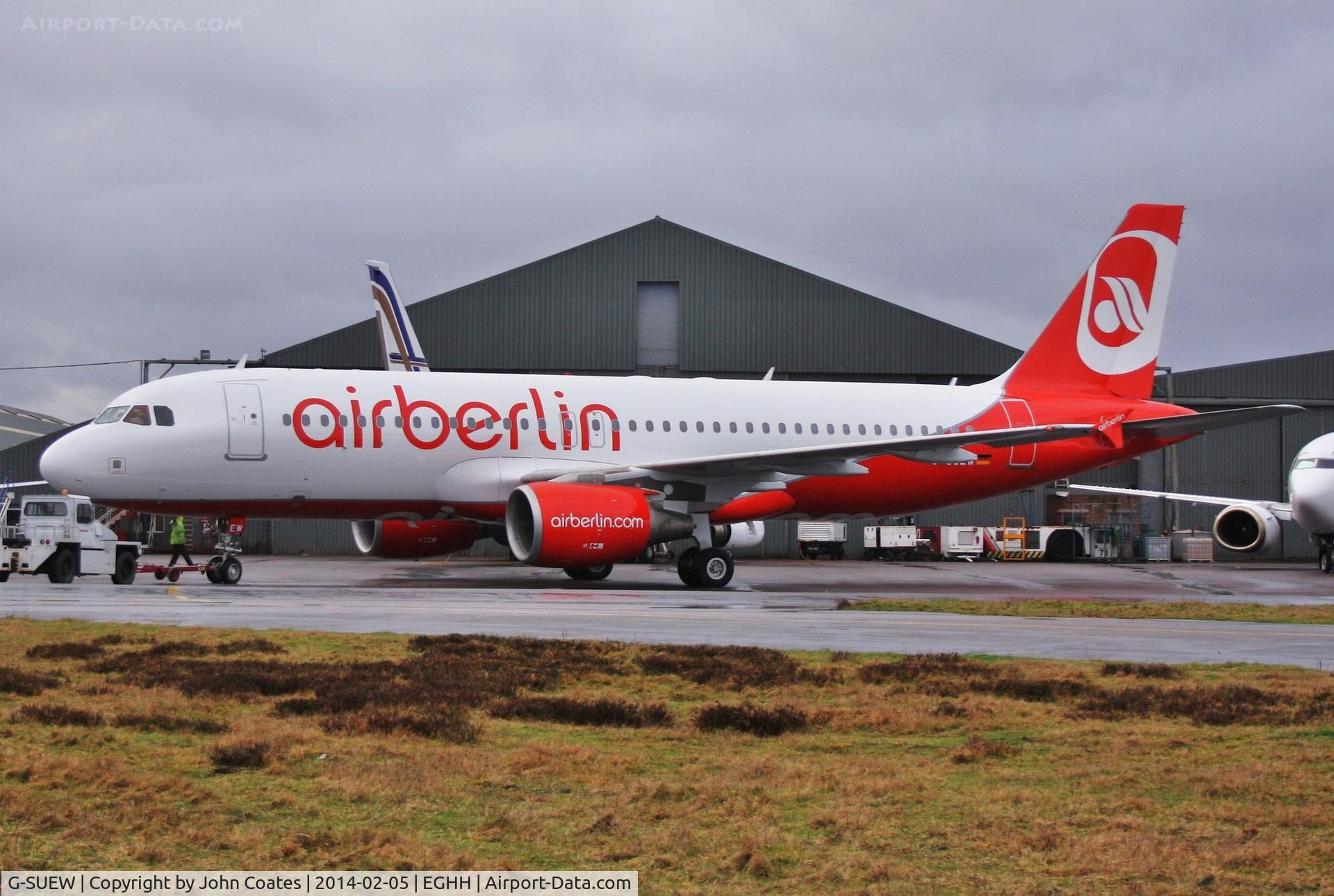 G-SUEW, 2003 Airbus A320-214 C/N 1961, Leaving European apron after repaint