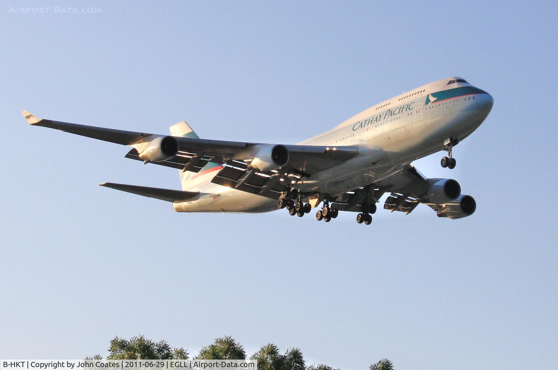 B-HKT, 1992 Boeing 747-412 C/N 27132, Finals to 27L in dawn sunshine