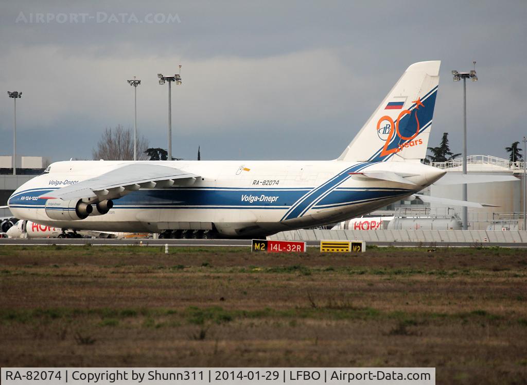 RA-82074, 1994 Antonov An-124-100 Ruslan C/N 9773051459142, Parked at the Cargo apron with additional 20th anniversary sticker on tail