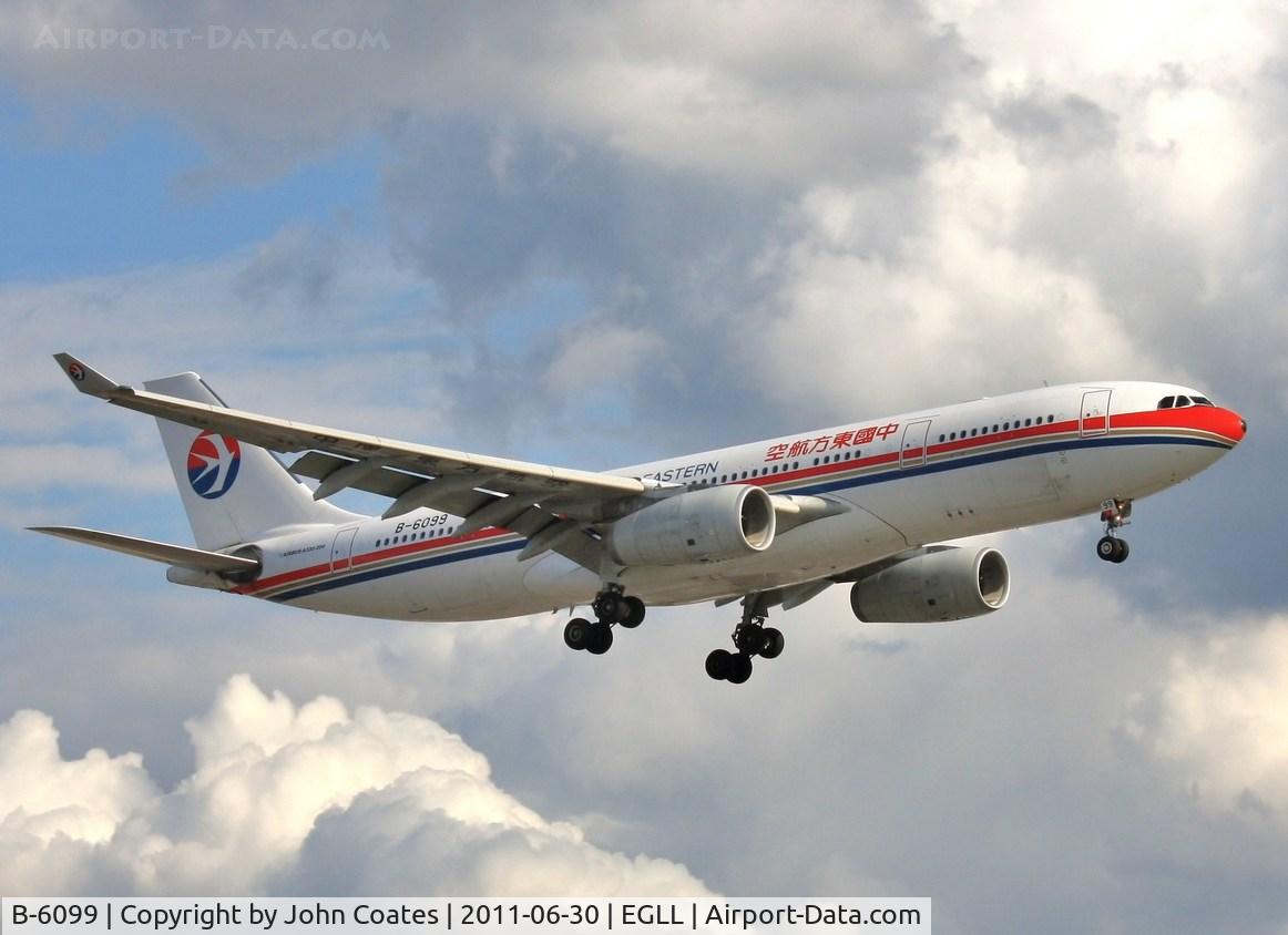 B-6099, 2008 Airbus A330-243 C/N 916, Evening arrival to 27R