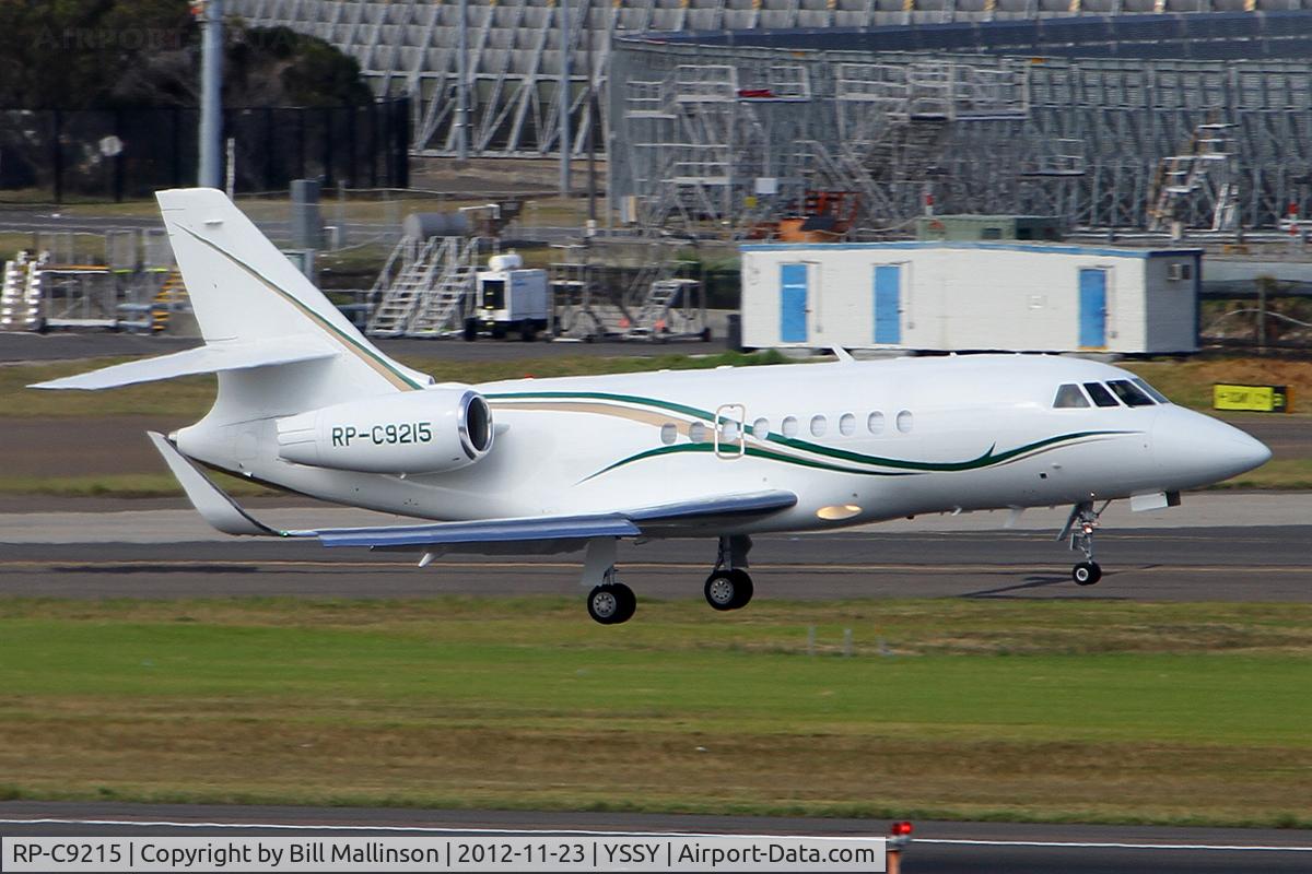 RP-C9215, 2010 Dassault Falcon 2000LX C/N 215, about to touch onto 16R