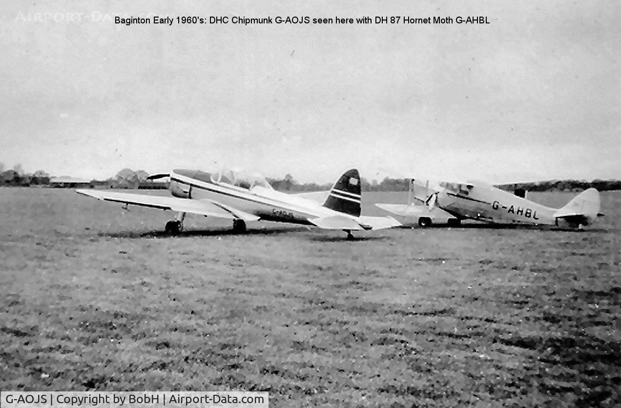 G-AOJS, 1950 De Havilland DHC-1 Chipmunk 22A C/N C1/0192, Picture taken Circa 1960. G-AOJS seen here with Hornet Moth G-AHBL.
