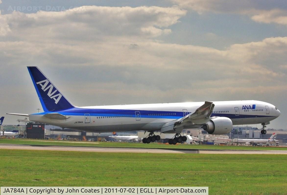 JA784A, 2009 Boeing 777-381/ER C/N 37950, Touchdown 27R