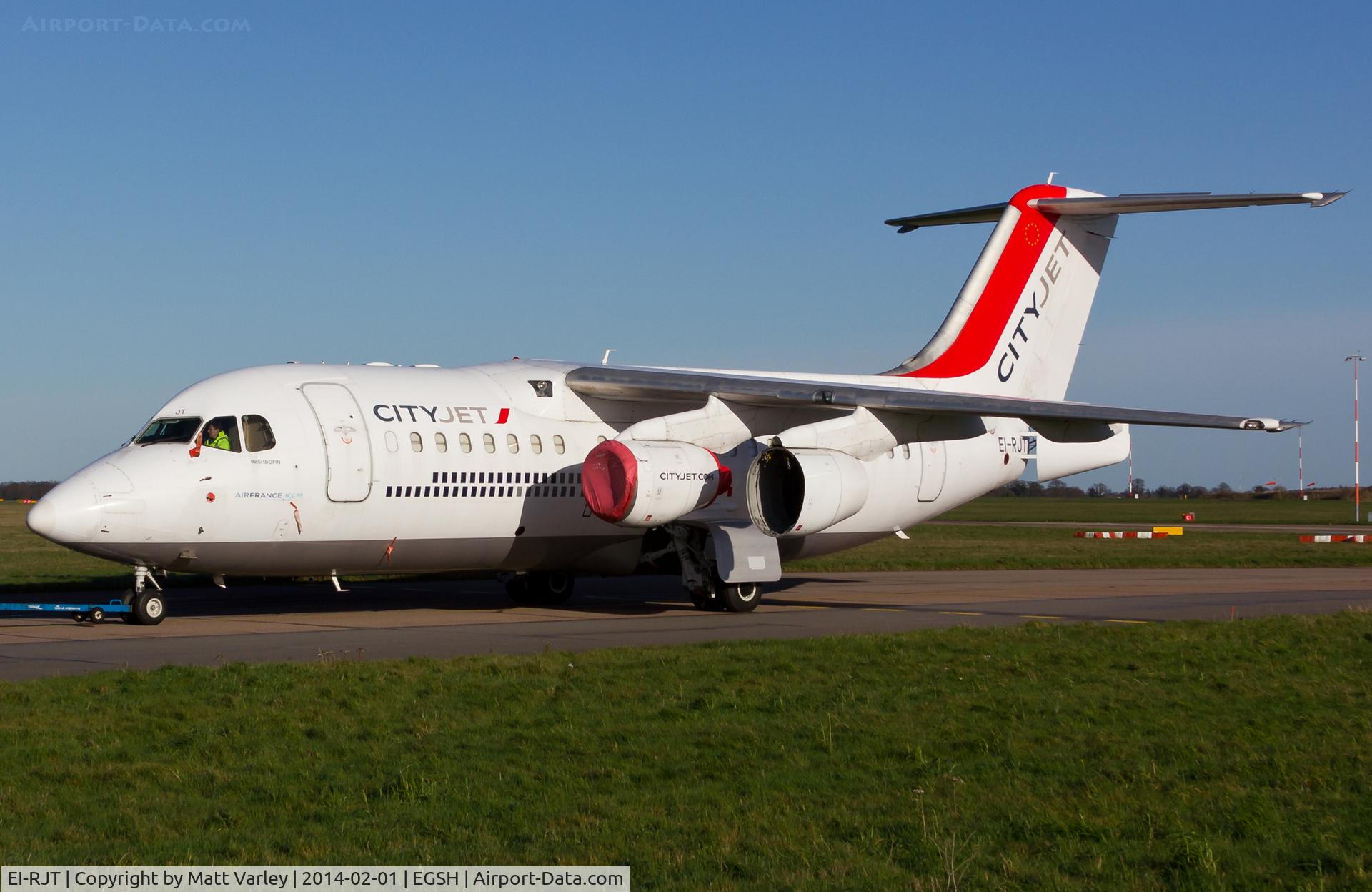 EI-RJT, 2000 British Aerospace Avro 146-RJ85A C/N E2366, Being towed to the NW corner....