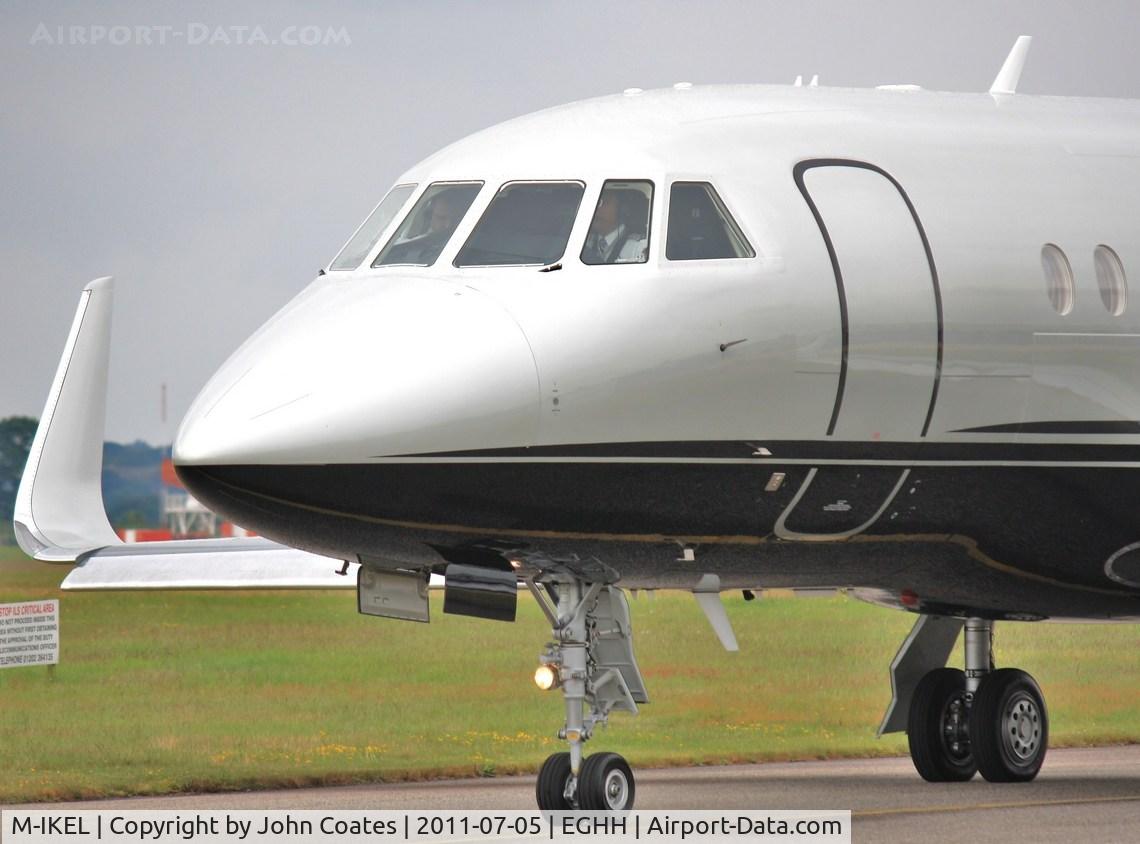 M-IKEL, 2010 Dassault Falcon 2000LX C/N 216, Close view from the Flying Club cafe
