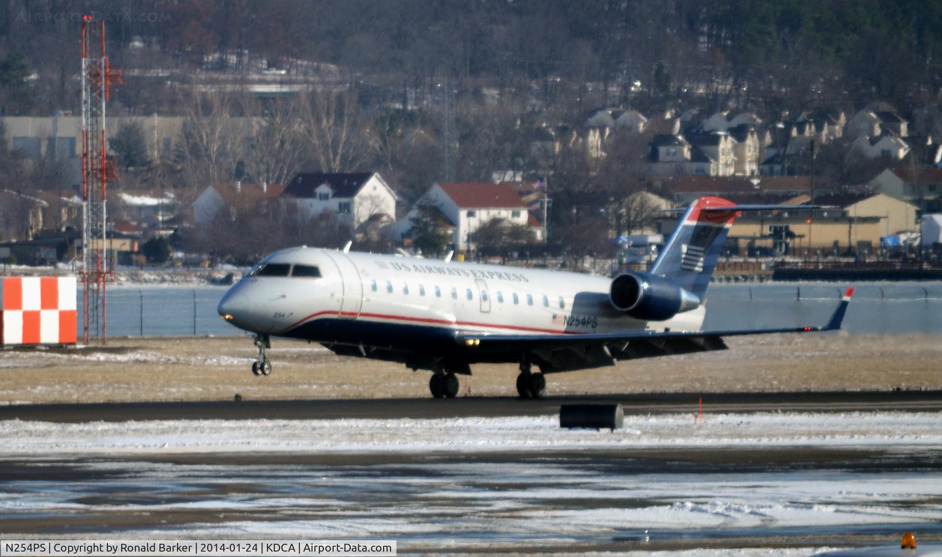 N254PS, 2004 Bombardier CRJ-200ER (CL-600-2B19) C/N 7935, Landing National